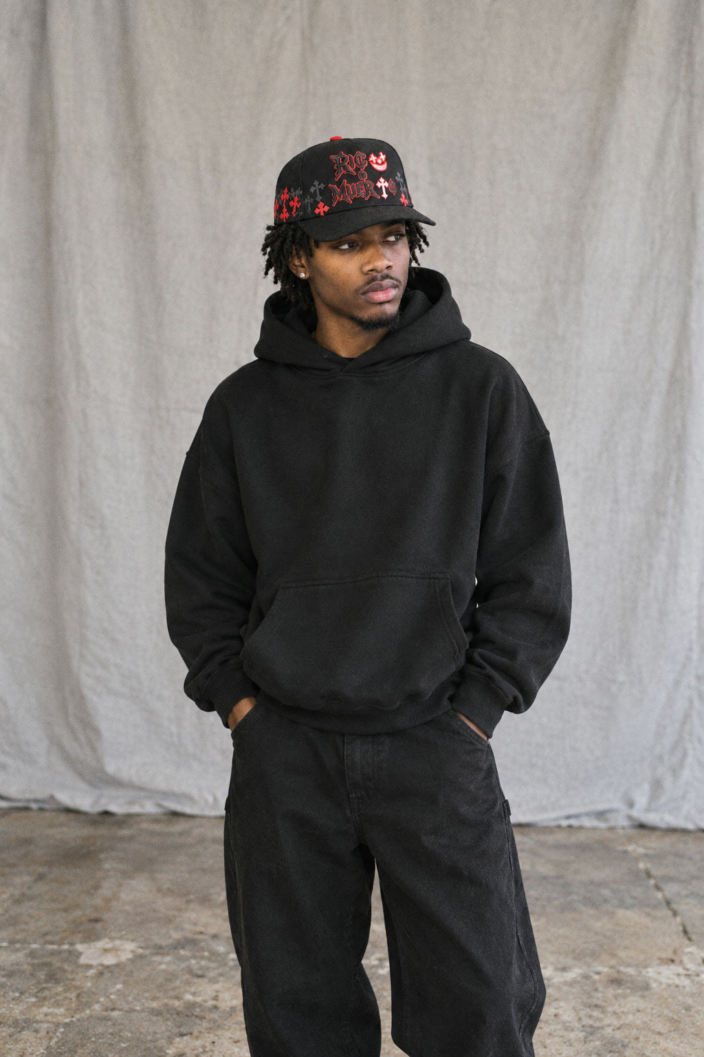 Red Crosses Black Cap